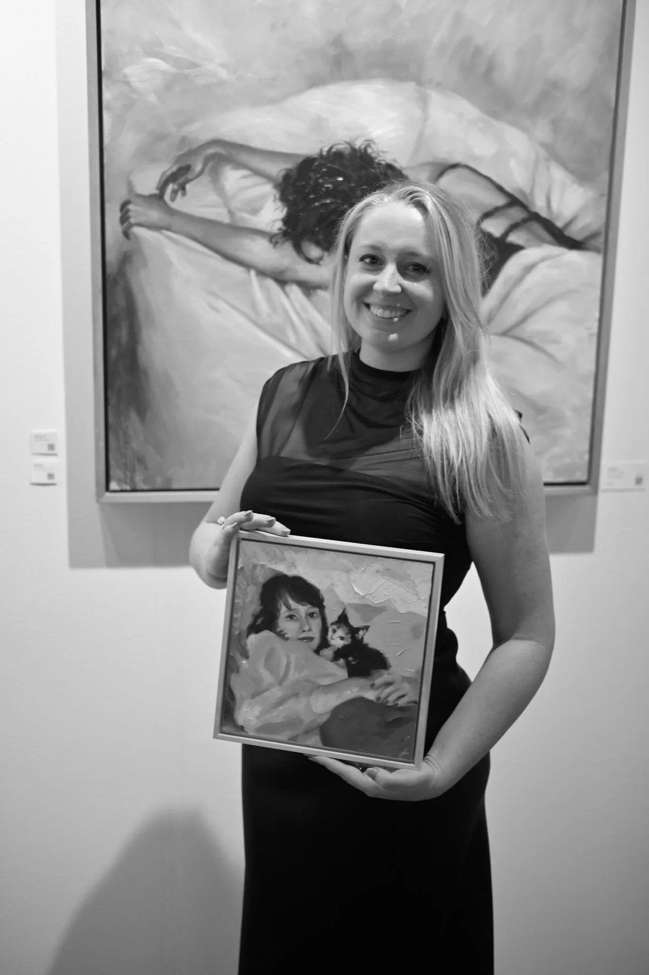 artist_holding_portrait_v2.webp